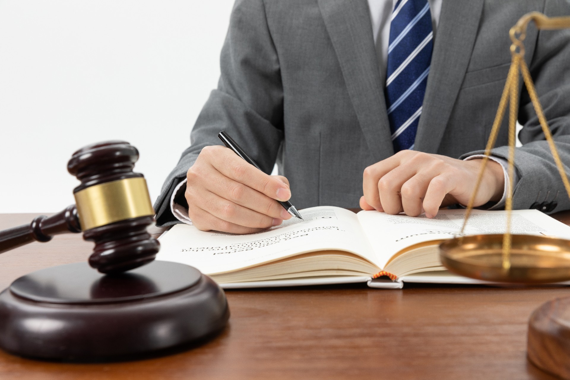 Lawyer taking notes in his office